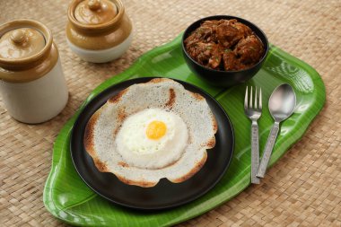 Sri lanka yumurta toplayıcısı, bittara aappa Appam popüler kahvaltı krepi mayalanmış pirinç hamuru, Hindistan cevizi sütlü Silk Lanka Güney Hint Kerala, Tamil Nadu. Hint sebzesi..