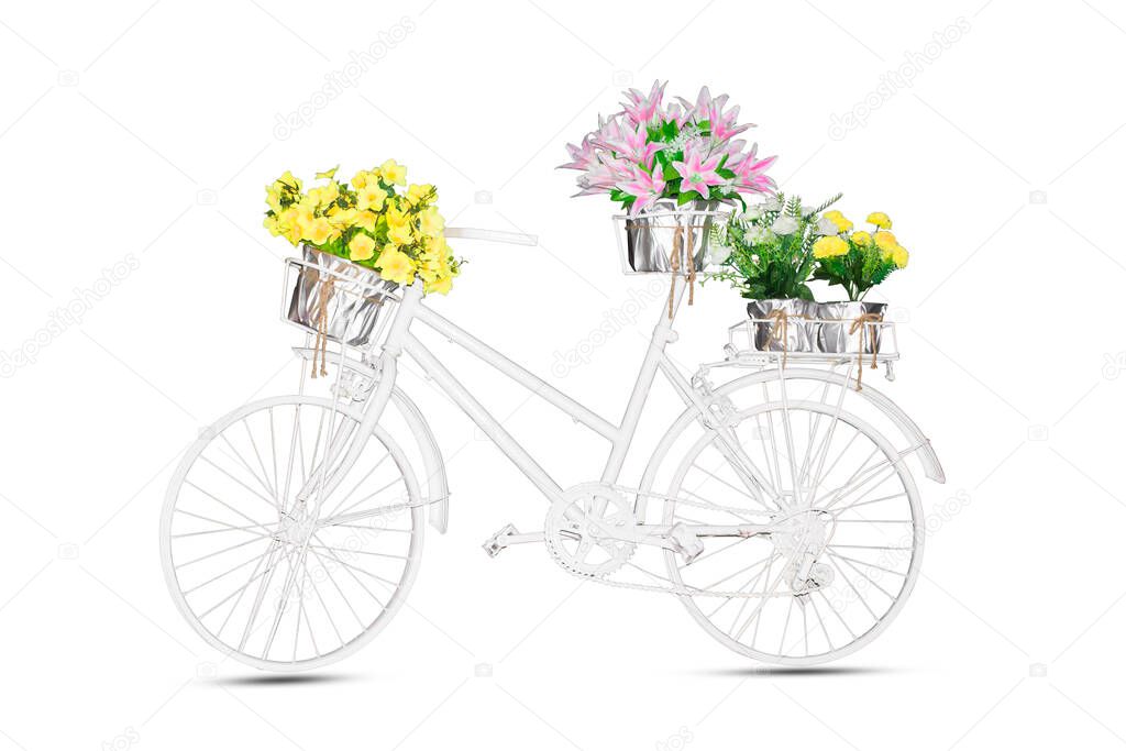 White bike on the seat and basket flowers isolated on white background.