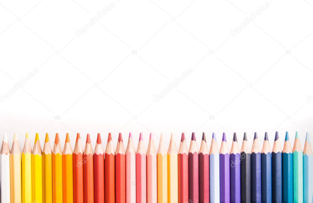 Top viwe. Color wood pencils isolated on white background.Copy space for your text.