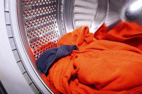 Dirty laundry in the washing machine. Laundry. Washing machine inside.