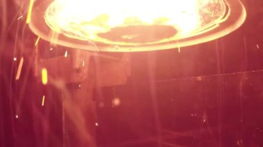 slow-motion footage of burning and explosion of gunpowder as space