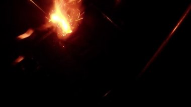 slow-motion footage of burning and explosion of gunpowder as space