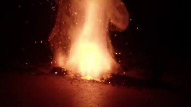 slow-motion footage of burning and explosion of gunpowder as space