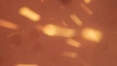 slow-motion footage of burning and explosion of gunpowder as space