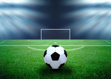 futbol sahası ve parlak ışıklar
