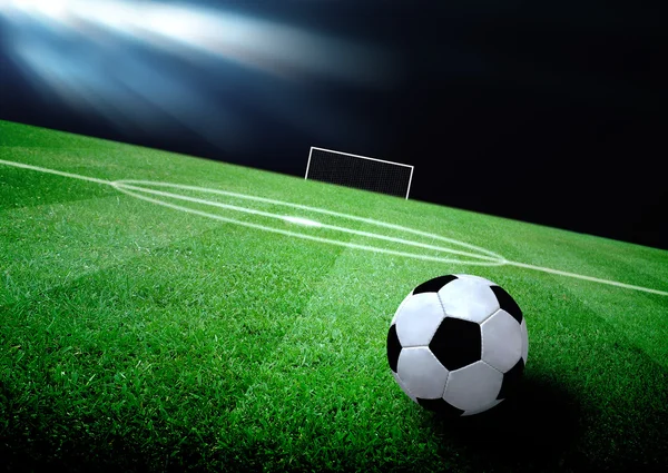 futbol sahası ve parlak ışıklar