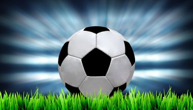 futbol sahası ve parlak ışıklar