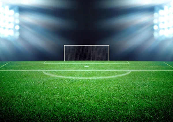 futbol sahası ve parlak ışıklar
