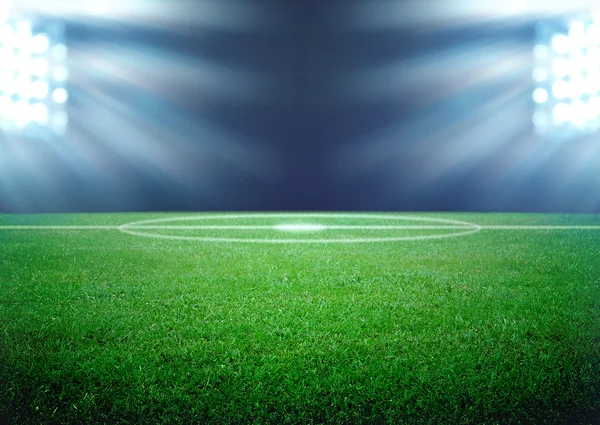 futbol sahası ve parlak ışıklar