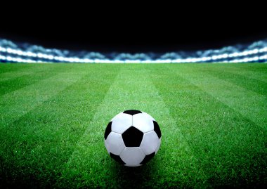 futbol sahası ve parlak ışıklar