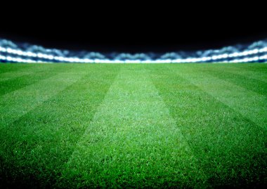 futbol sahası ve parlak ışıklar