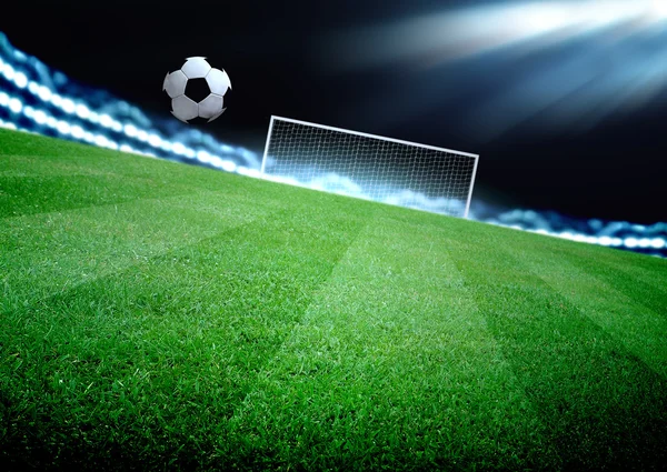 futbol sahası ve parlak ışıklar