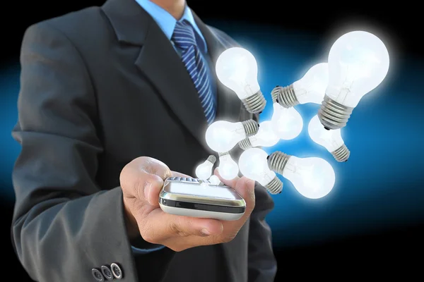 Light bulb in women hand — Stock Photo, Image