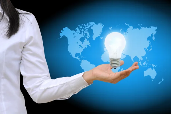 Light bulb in women hand — Stock Photo, Image