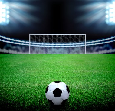 futbol sahası ve parlak ışıklar