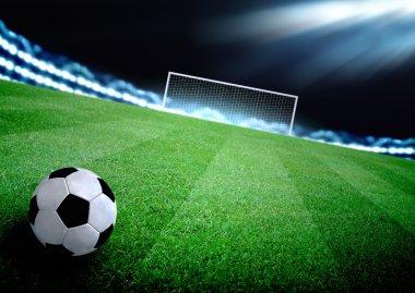 futbol sahası ve parlak ışıklar