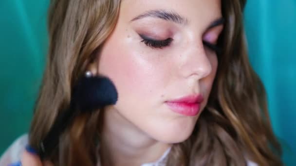 Makeup Artist Applies Powder Brush Face Beautiful Female Model — Stock Video