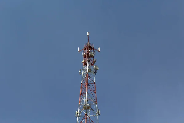 Telecommunication towers with wireless antennas on sky background. Cellular phone antenna. Technology on the top of the telecommunication GSM 5G,4G,3G tower.