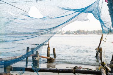 Chinese fishing nets, shore of Kochi, Kerala in India, Cheenavala or tangkul, traditional stationary lift net, industry