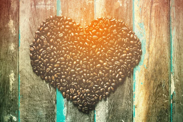 Kaffe bean på trä — Stockfoto