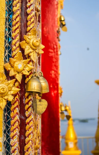 Bell hanging on gate — Stock Photo, Image