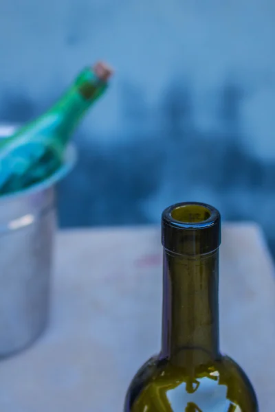 Wine bottles in  bucket — Stock Photo, Image