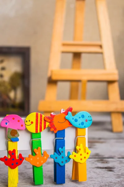 Colorful peg in a row — Stock Photo, Image