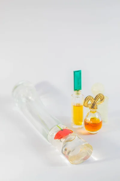 Perfume bottle lying — Stock Photo, Image