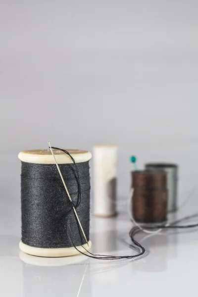 Roll of black thread — Stock Photo, Image