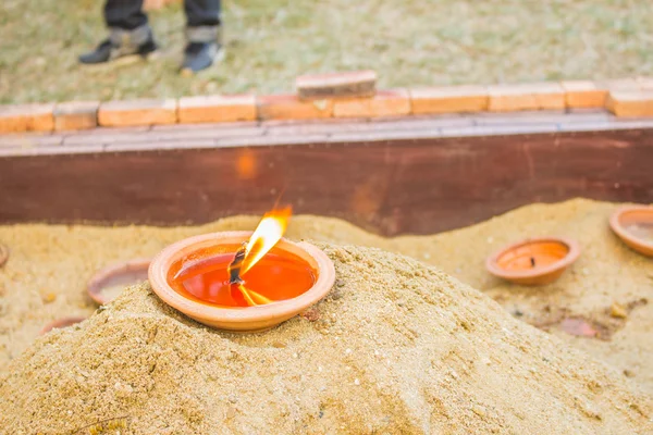 Candle burning on a candlestick — Stock Photo, Image