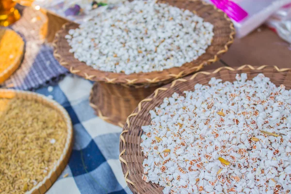 Popped rice in wooden containers — Stock Photo, Image