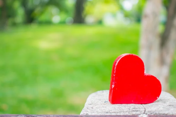 Red heart on the concrete — Stock Photo, Image