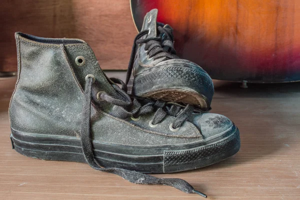 Sneakers on a wooden — Stock fotografie