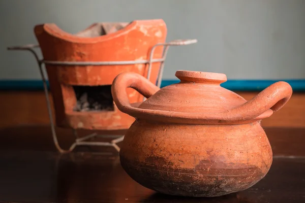 Clay pots on old wood — Stock Photo, Image