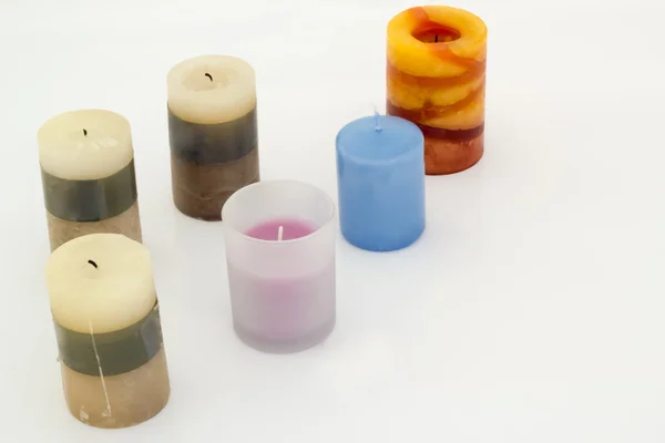 Decoratieve kaarsen op de geïsoleerde achtergrond — Stockfoto