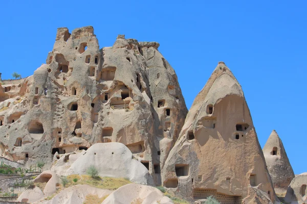 Mağaralarda spectalar kayalar, Kapadokya, Türkiye — Stok fotoğraf