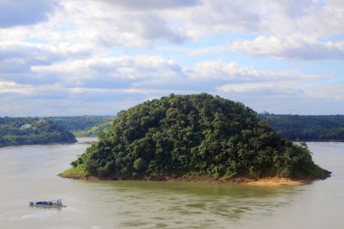 Acaray island on the border of Brazil and Paraguay clipart