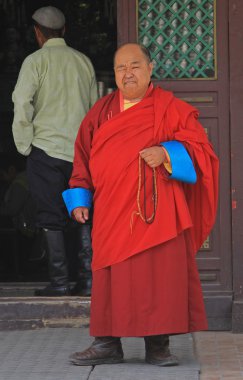 monk is standing nearly buddhist temple in Ulaanbaatar