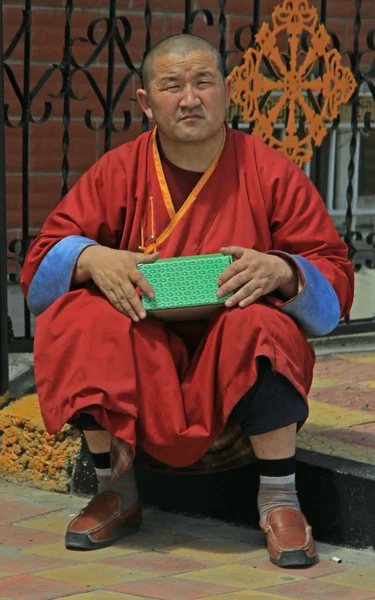 Monk is sitting nearly buddhist temple — Stock Fotó