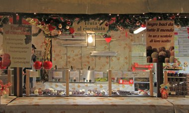 one of kiosks on the Christmas fair in Verona clipart