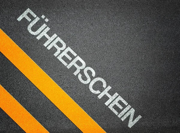 Deutscher Führerscheintext schreiben Straßenasphalt — Stockfoto