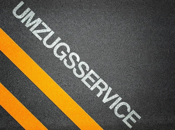 Deutscher Umgsservice Umzugstexte schreiben Straßenasphalt — Stockfoto