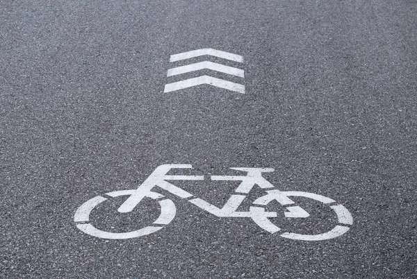 Bicycle path with Bicycle sign and direction arrow