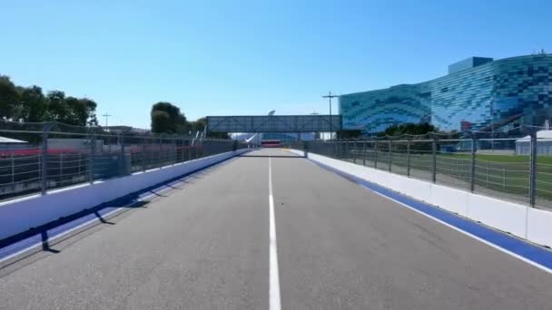 Sochi, Russia - 01 apr 2021: stand and track Sochi Autodrom, start and finish area, air view — стокове відео