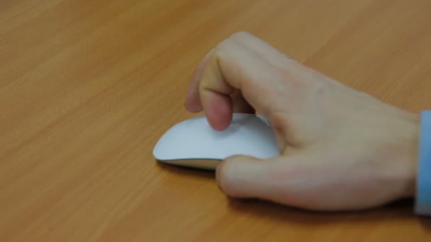 hand clicking computer mouse