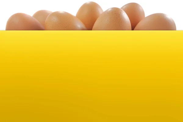 Sárga színű papír és a húsvéti tojás — Stock Fotó