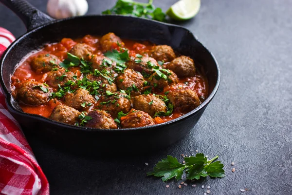 Beef  meatballs with tomato sauce in pan — Stock Photo, Image