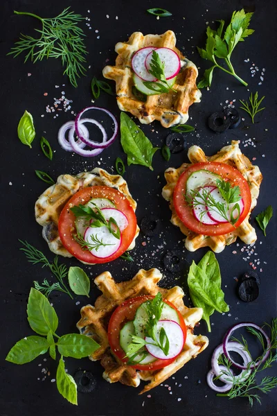 Savory waffles with cheese, ham, olives and herbs, served with f — Stock Photo, Image