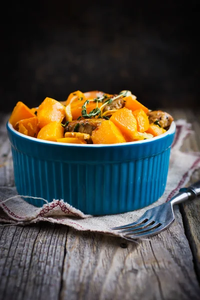 Roasted pumpkin and meat on the pan — Stock Photo, Image