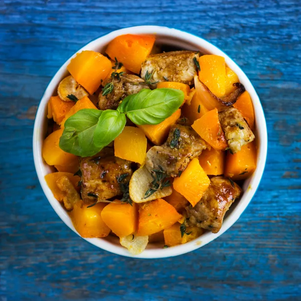 Roasted pumpkin and meat on the pan — Stock Photo, Image